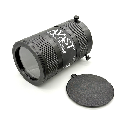 Avast Marine Porthole Studio for DSLR. 3D-printed underwater coral and fish photography gear. Black camera lens with accessories on a white background. 
